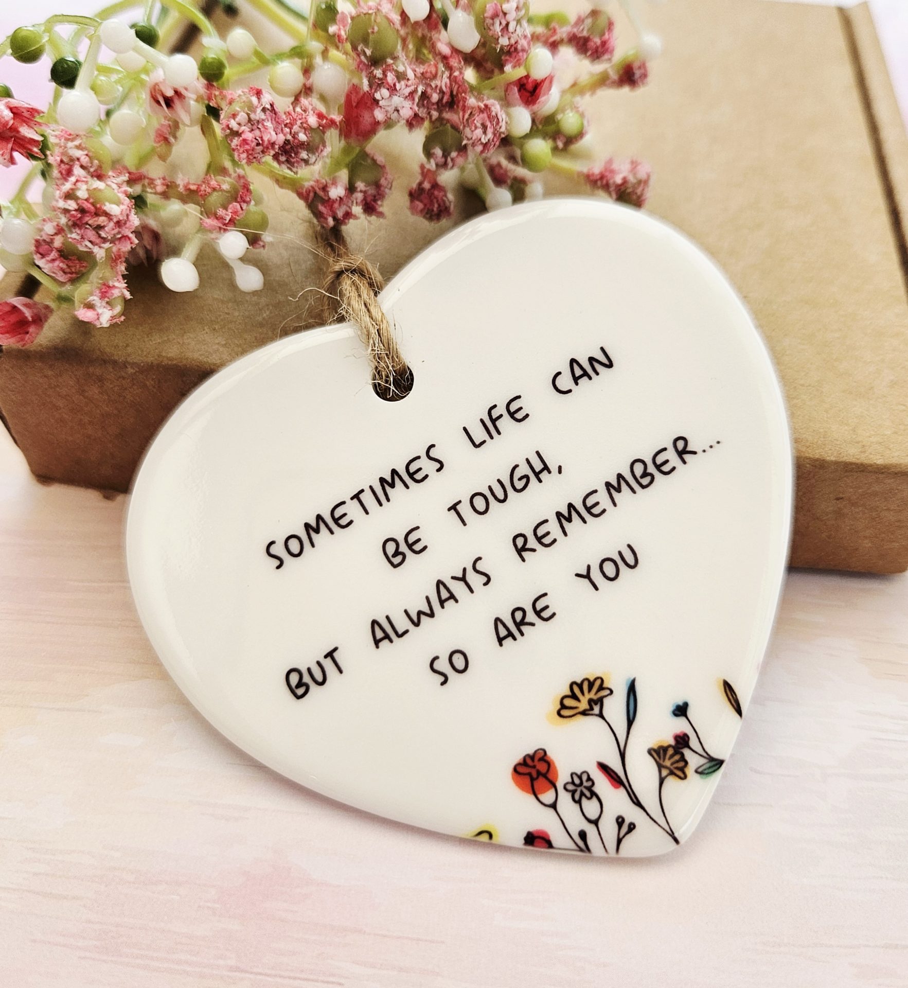 Encouragement gift idea ceramic heart decoration with floral artwork and ribbon