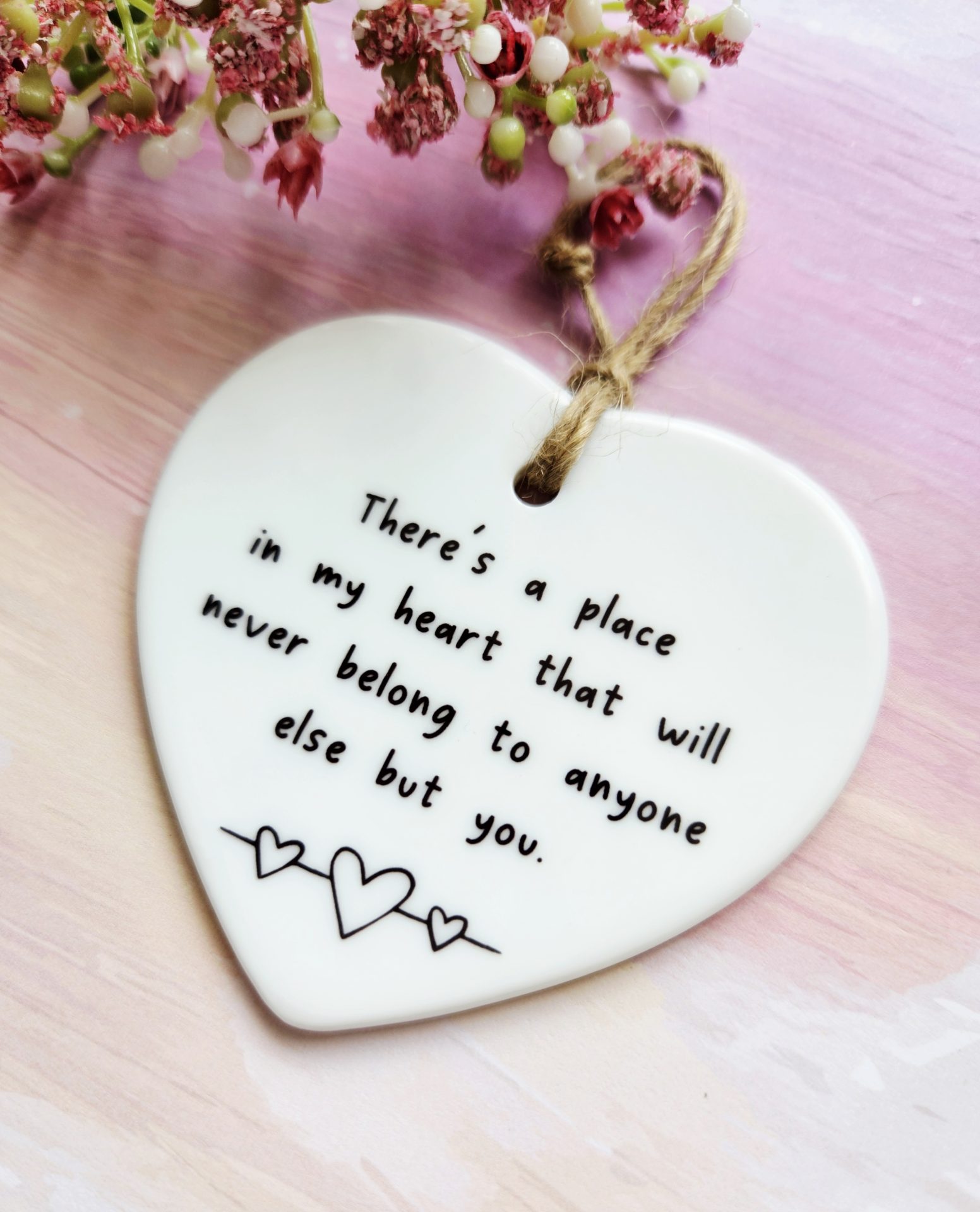 Handmade ceramic heart ornament with sentimental quote and heart design