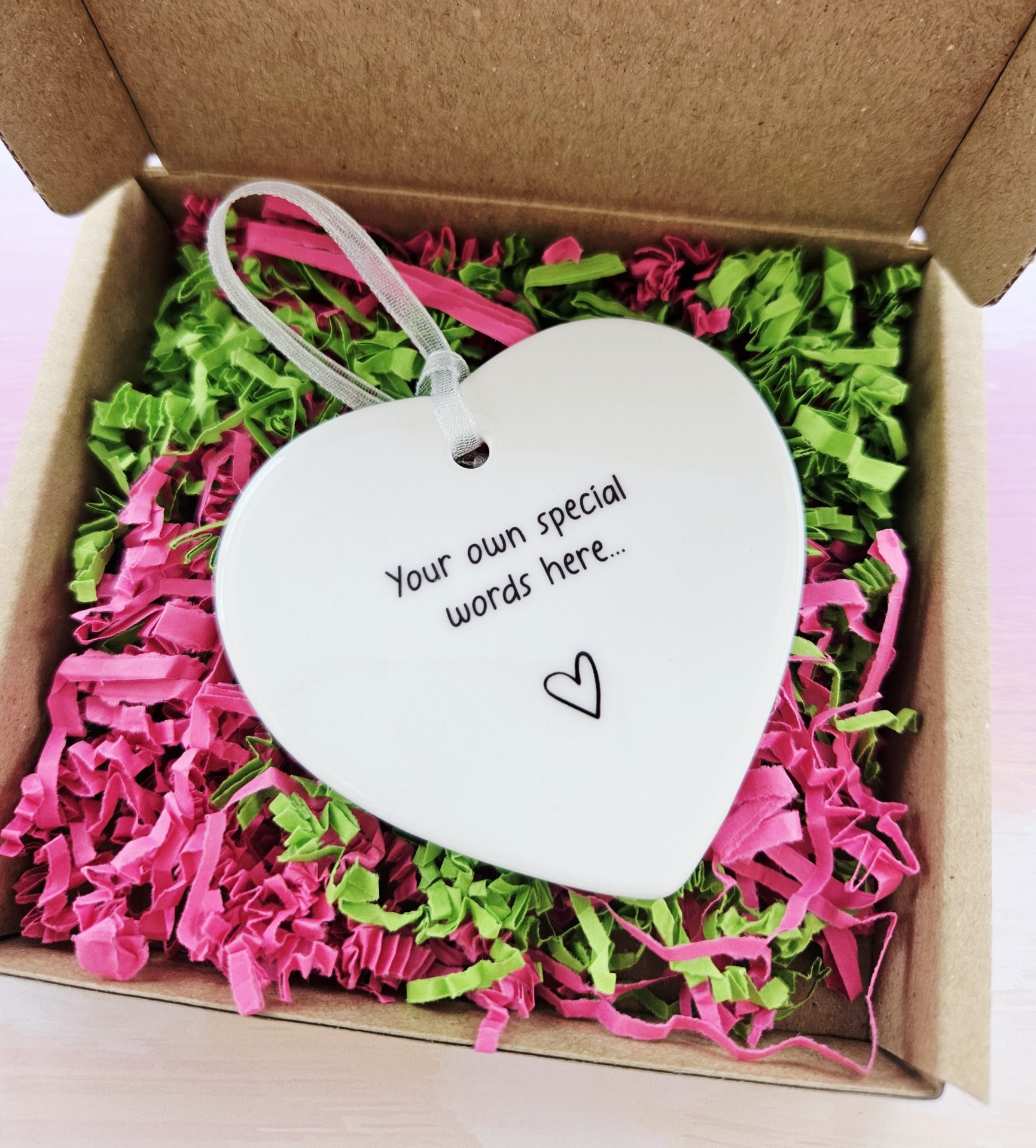 Personalised ceramic heart keepsake in presentation gift box with pink and green shredded paper
