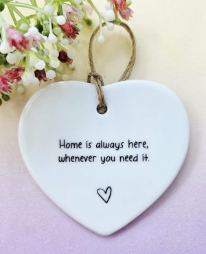 Ceramic heart keepsake displaying the quote ‘Home is always here, whenever you need it