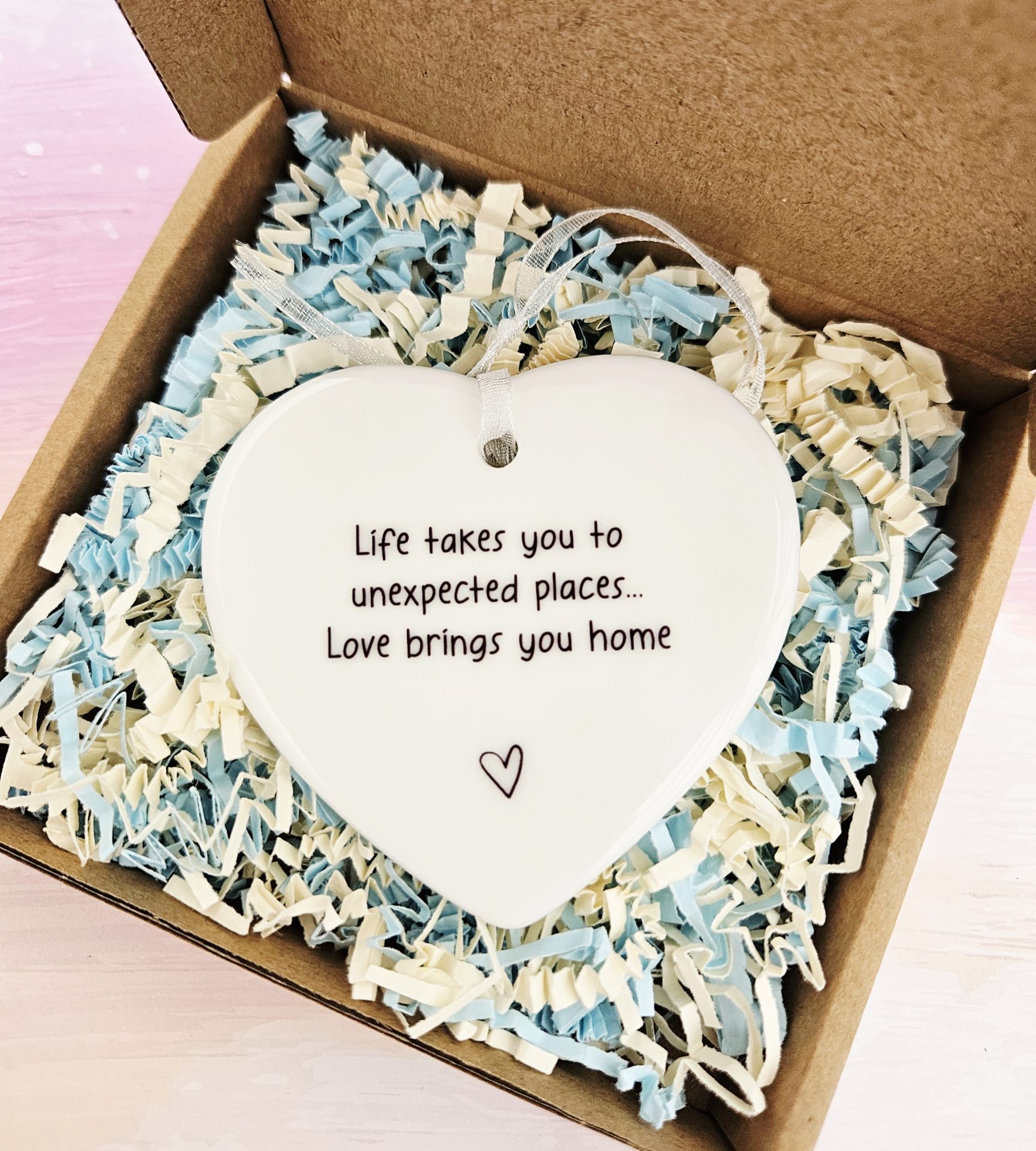 Ceramic heart keepsake gift box with soft blue and cream shredded paper
