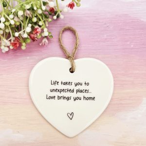Life takes you to unexpected places, love brings you home ceramic heart keepsake with floral styling