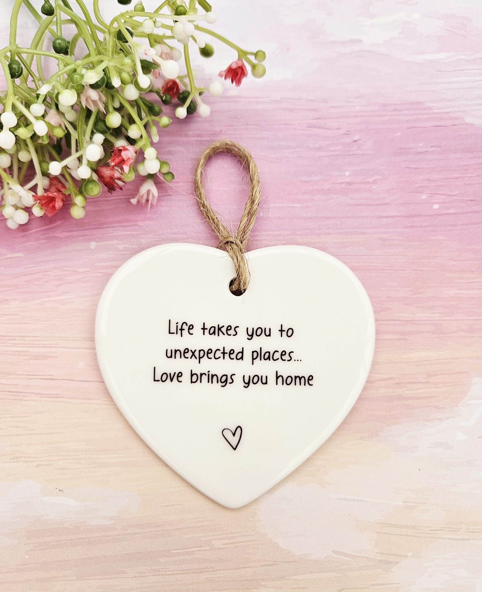 Life takes you to unexpected places, love brings you home ceramic heart keepsake with floral styling