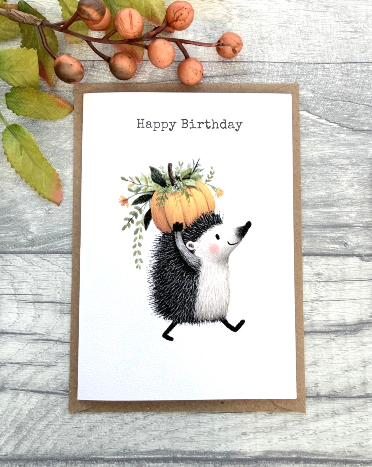 Woodland hedgehog birthday card with pumpkin illustration and kraft brown envelope